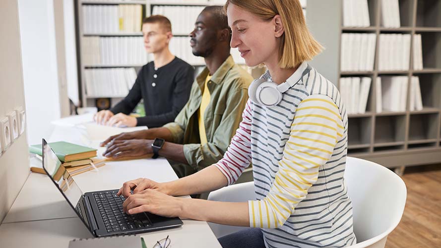 Group of office workers at their computers